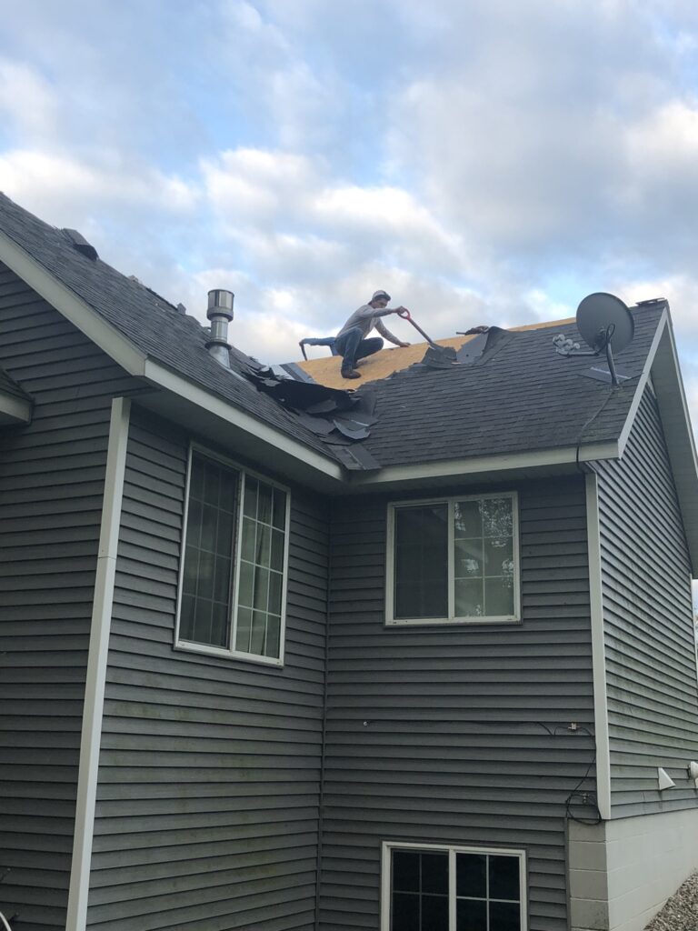 Roof work in progress on a home in Sauk Rapids, MN