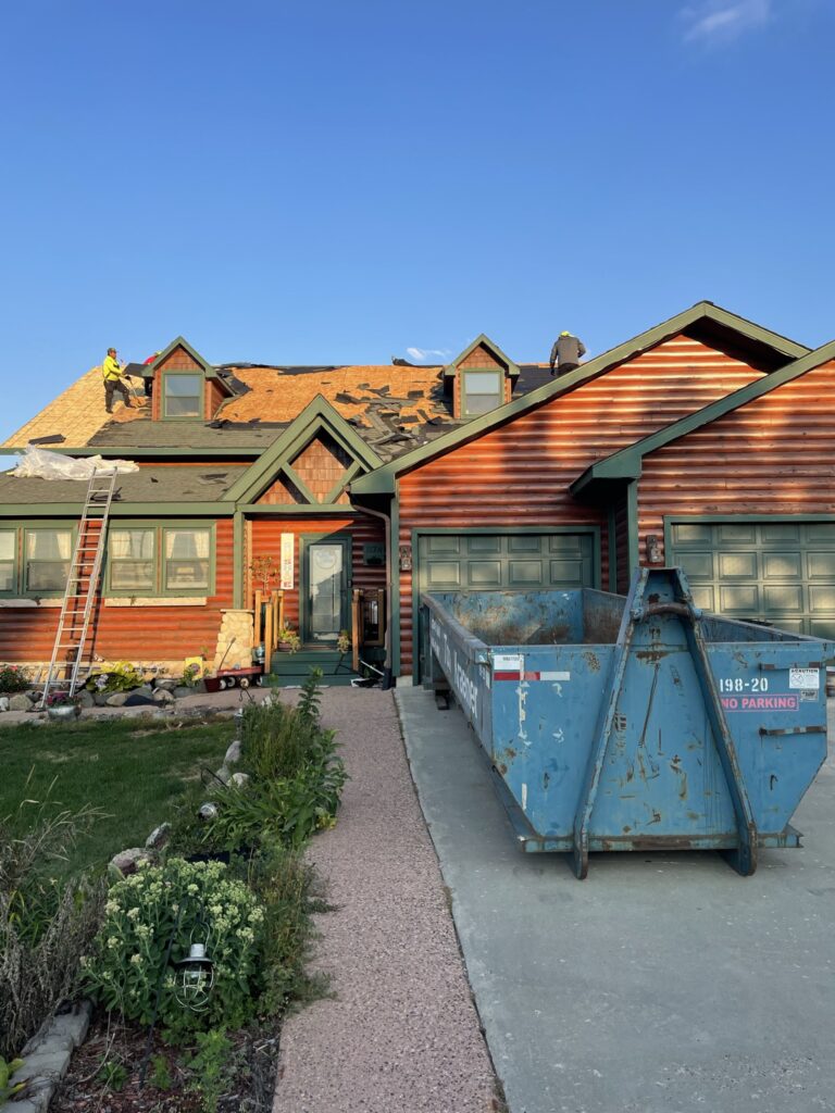 Roof tear-off in progress on a home near Geneva Golf Club in Alexandria, MN