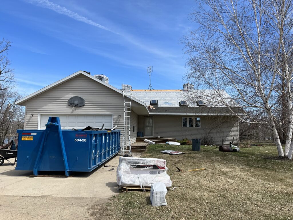 Roof tear-off and replacement on a lakeside home near Osakis, MN with Atlas shingles